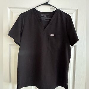 Figs uniform shirt only.